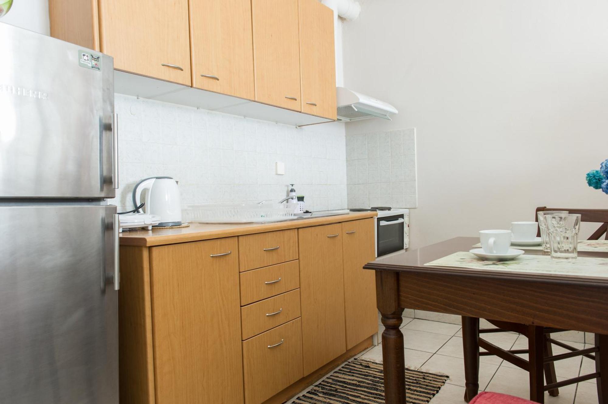 Kamari Blue Apartments Каламата Экстерьер фото