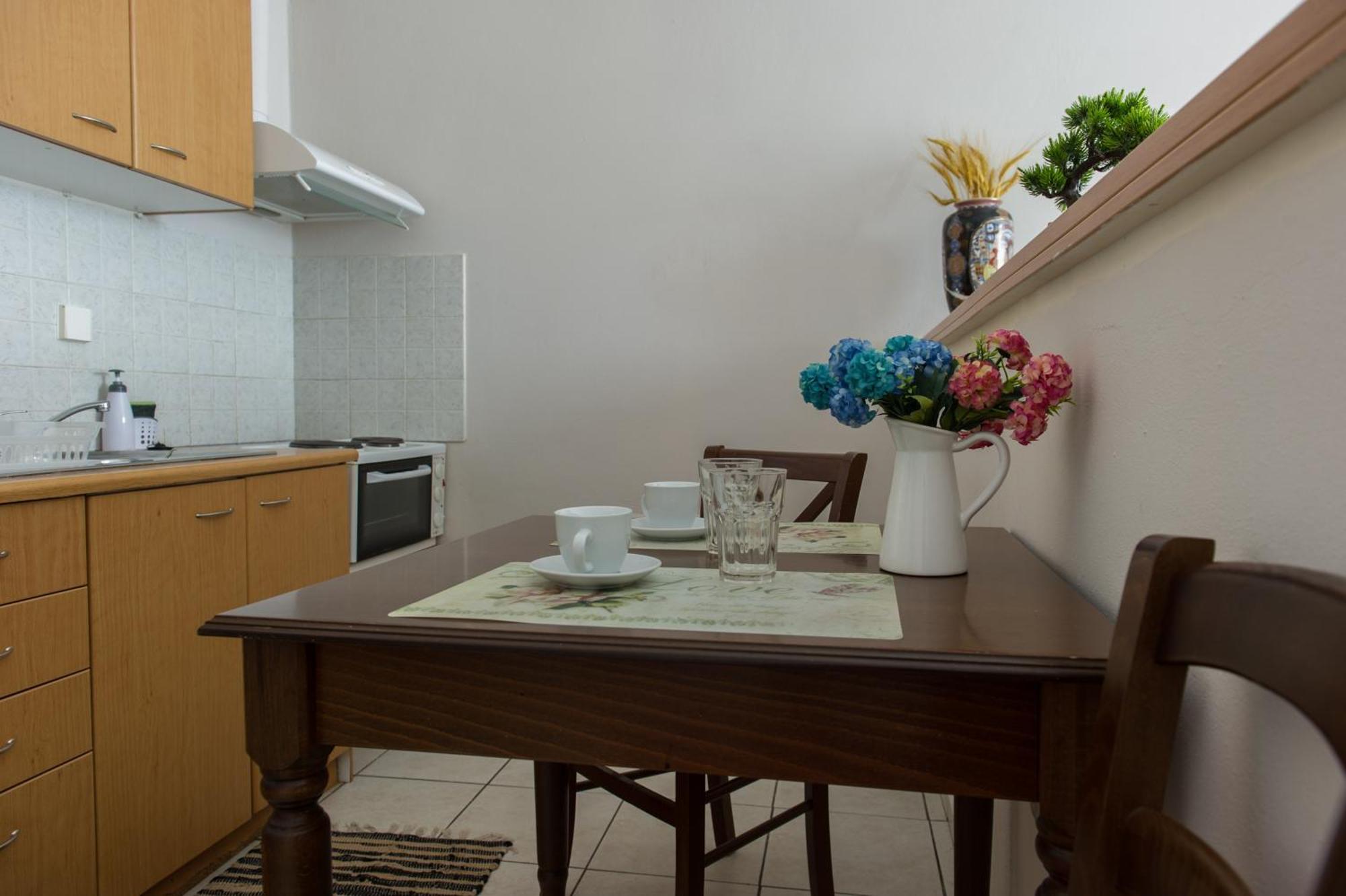 Kamari Blue Apartments Каламата Экстерьер фото