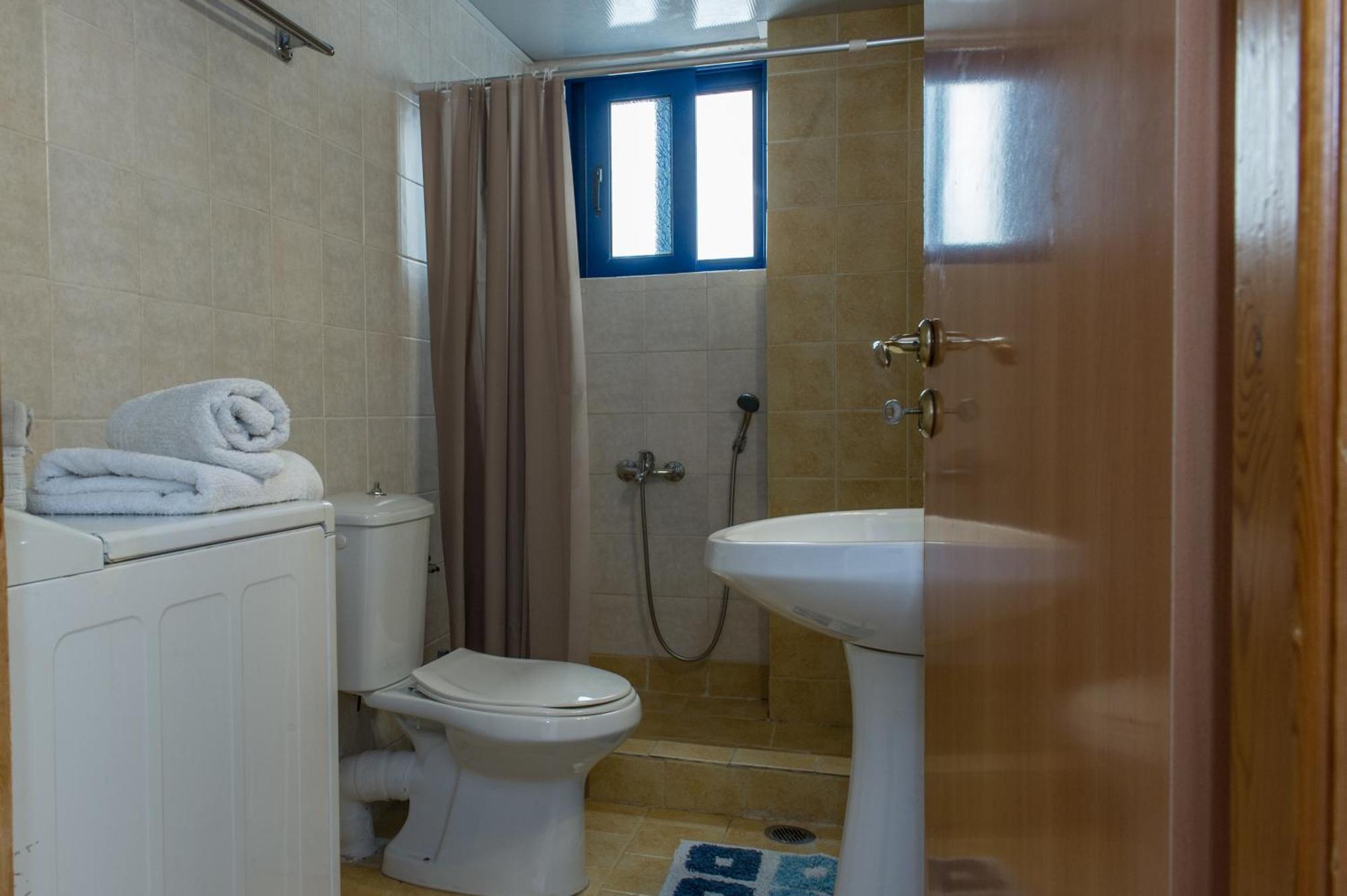 Kamari Blue Apartments Каламата Экстерьер фото